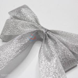 Delicate silver metallic bowknot