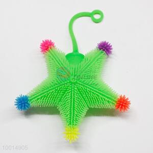 Star-shaped puffer ball with rope