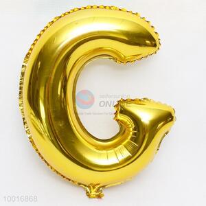 Letter G shaped gold foil balloon
