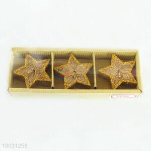 Golden star shaped scented wish candle