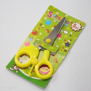 Student scissors with yellow plastic handle