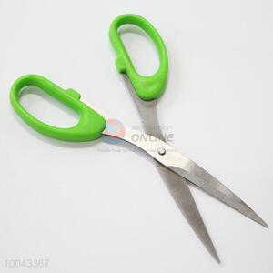 Sharp professional scissors with green handle