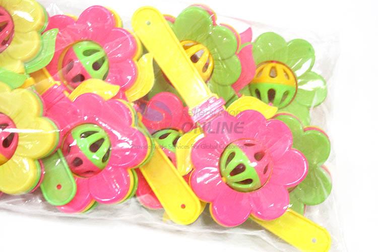 High grade custom flower shape hand bell rattle toy for baby