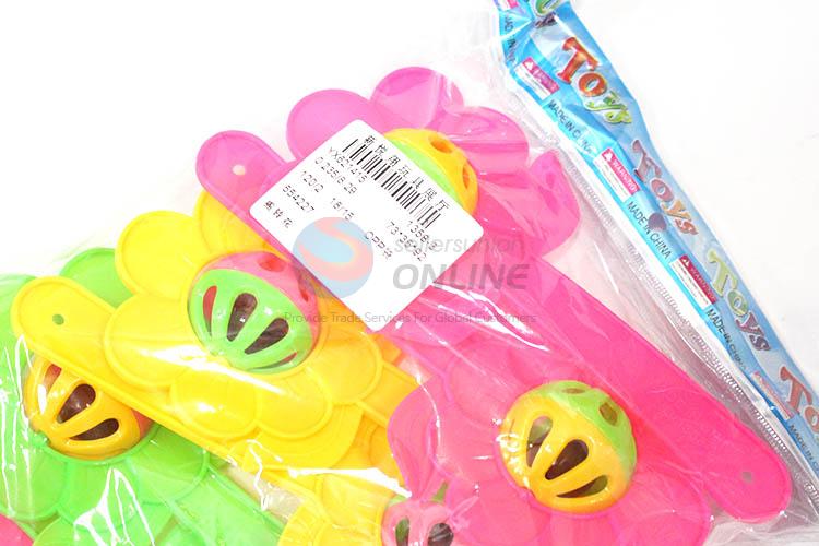 Wholesale cheap flower shape hand bell rattle toy for baby