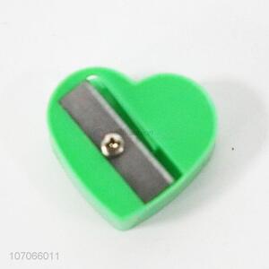 Promotional creative heart shape plastic pencil sharpener for kids