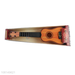 Low price 4 strings kids ukulele guitar toy musical instrument