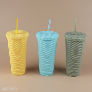 Good quality reusable double-walled plastic tumbler with lid and <em>straw</em>