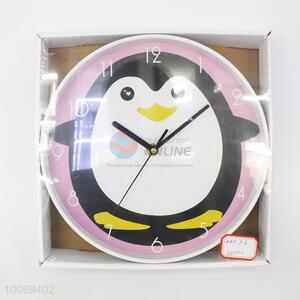 Round plastic wall clock with penguin pattern