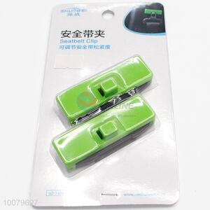 Plastic green seatbelt clip