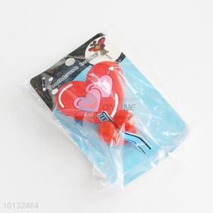Red heart shaped toothbrush holder