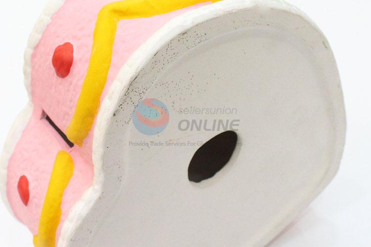 Popular low price daily use cake shape money box