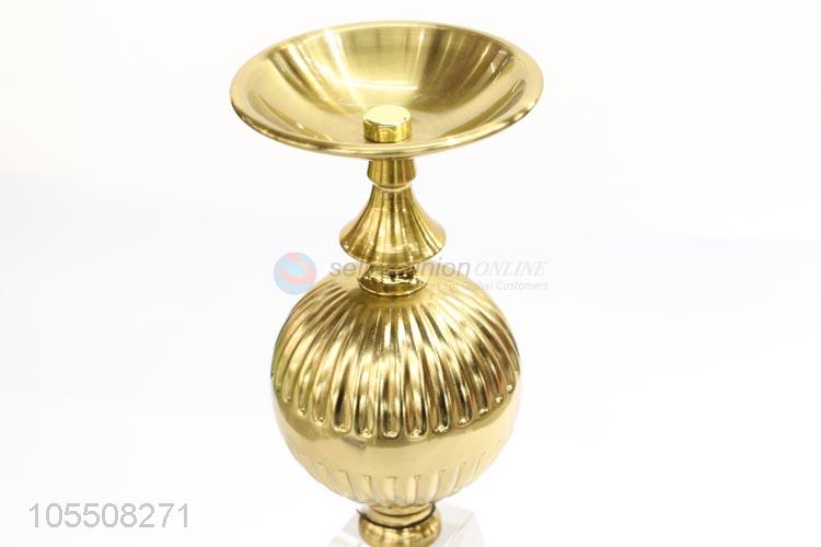 Customized golden iron candlestick with clear crystal base