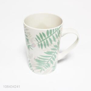 Hot selling delicate gree leaf pattern ceramic cup