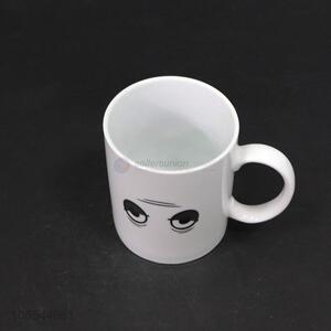 Super quality 300ml hot water color changing ceramic mug with eyes pattern