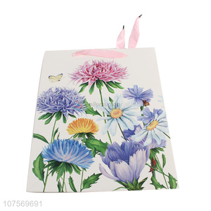 Wholesale exquisite flower pattern paper gift bag glitter packaging bag