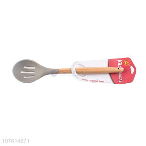 Hot selling natural wooden handle silicone slotted spoon for kitchen