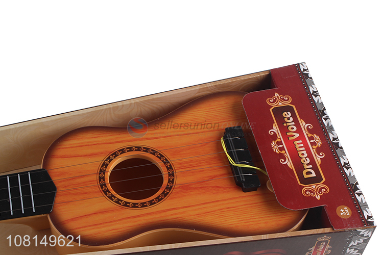 Low price 4 strings kids ukulele guitar toy musical instrument