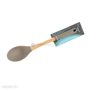 Good wholesale price wooden handle silicone dinner spoon