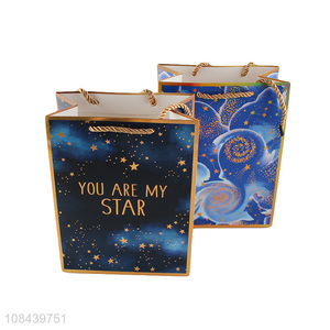 Yiwu direct sale fashion starry sky paper gifts bag