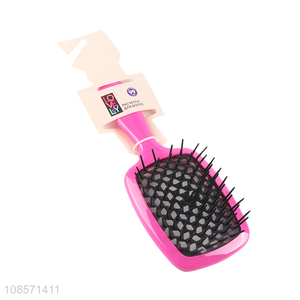 Wholesale hollowed out plastic detangling comb hair brush
