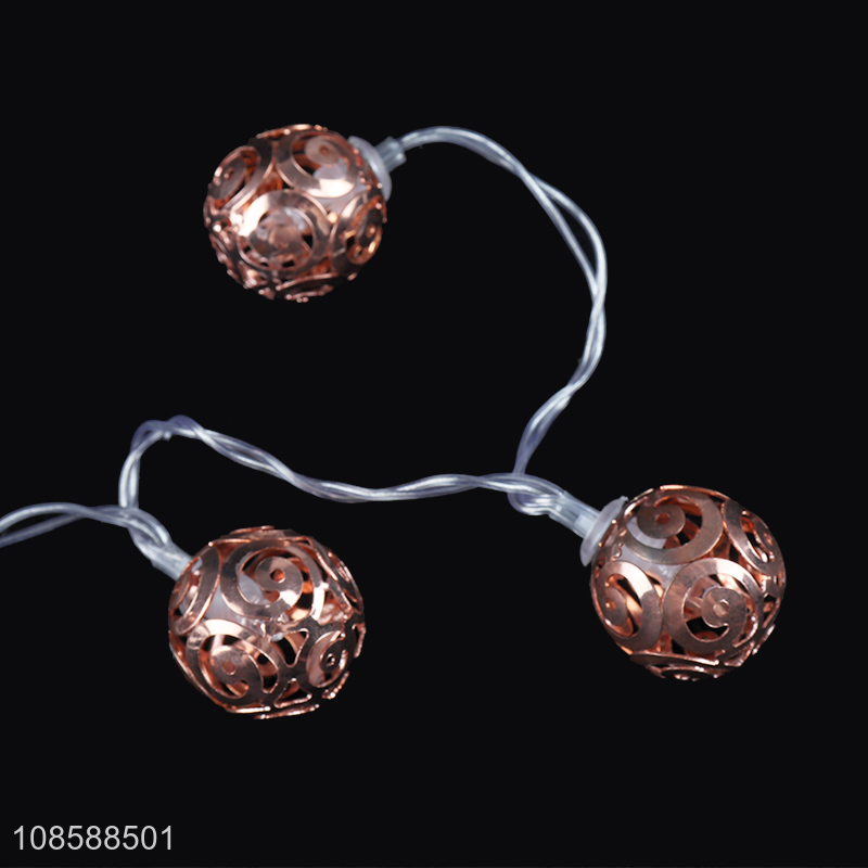 Wholesale AA battery operated rose gold hollowed-out metal ball led string light