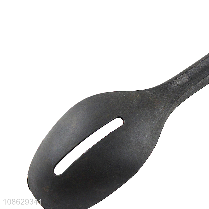 Good quality non-stick slotted basting spoon with wood grain handle