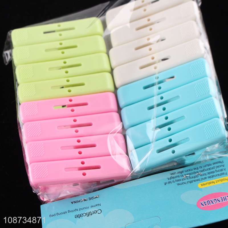 Wholesale 16 pieces plastic clothes pegs clothes clips with springs