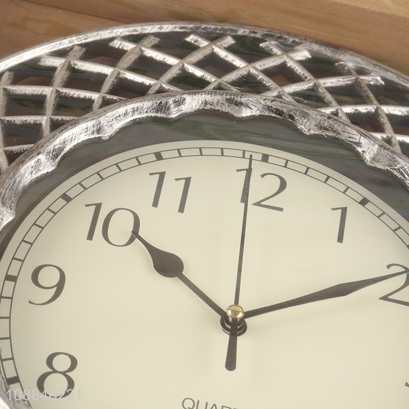 Online wholesale European retro hollowed-out quartz wall clock