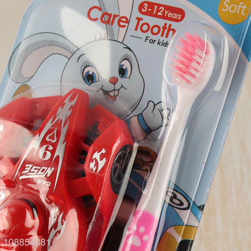 Popular Product Cute Manual Children's Toothbrush with Toy