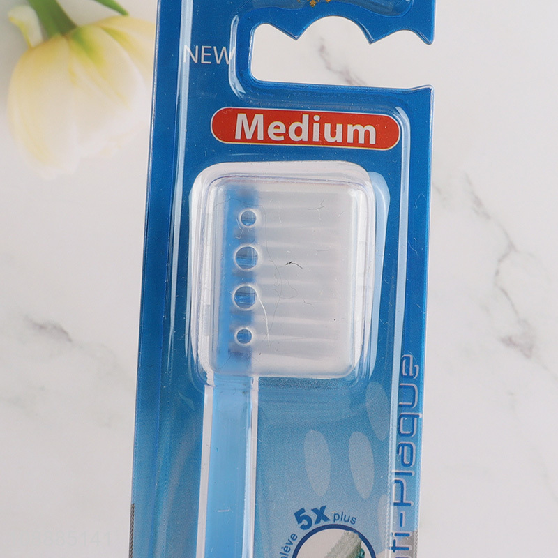 Wholesale manual adults toothbrush with plastic handle & medium bristles