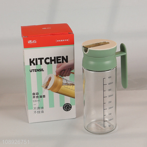 Wholesale 530ml glass olive oil dispenser bottle with automatic cap