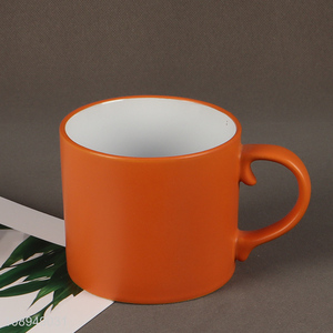 Low price orange <em>ceramic</em> water <em>cup</em> coffee <em>cup</em> with handle