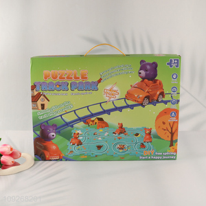 Yiwu market cartoon children <em>puzzle</em> game electric rail car toys for sale