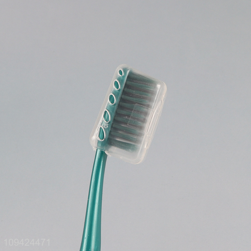 Dual-Ended Toothbrush With Tongue Cleaner